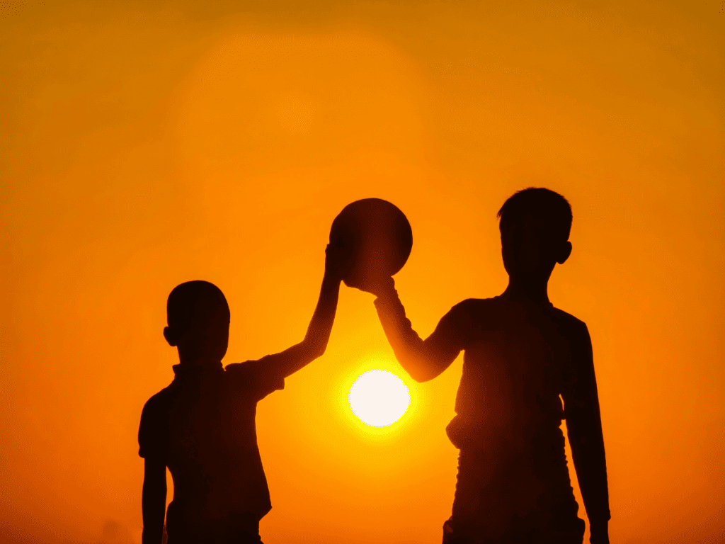 Two kids play together.