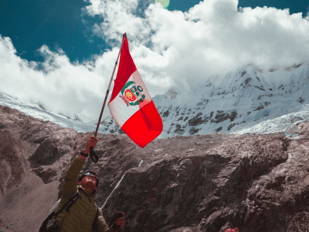 Peruvian flag in the mountains. 