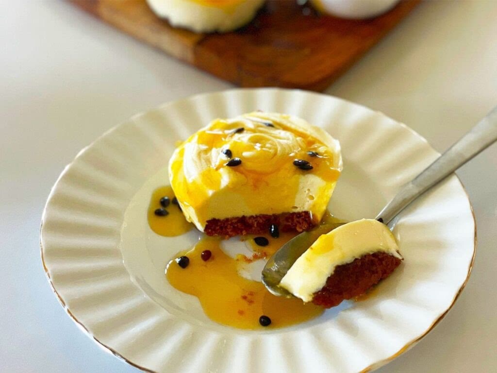 A cheesecake in Lima, Peru topped with passion fruit.